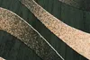 A close-up view of a rug with a modern abstract design. Anteprima dell’immagine prodotto