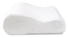 A white orthopedic pillow with a contoured shape, shown from a side angle against a white background. Produktbild-Vorschau