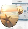 A toilet seat with a beach and starfish design, shown next to its packaging. Anteprima dell’immagine prodotto