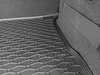 A close-up view of a black car trunk liner with a hexagonal pattern. Podgląd zdjęcia produktu