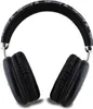 A pair of black wireless headphones with a patterned headband. Produktbild-Vorschau
