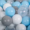 A close-up, overhead view of a pile of KiddyMoon play balls in various colors. Anteprima dell’immagine prodotto