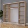 A modern, open wardrobe with shelves and a hanging rod, set against a concrete wall and wooden floor. Produktbild-Vorschau