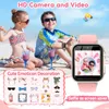 Two children are sitting on a beach with drinks, and a smartwatch is shown in the foreground. Náhled obrázku produktu