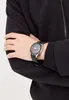 A person's arm wearing a watch. Produktbild-Vorschau