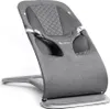 A gray baby bouncer chair is shown against a white background. Produktbild-Vorschau