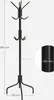 A black metal coat rack with gold accents is shown against a white background, with dimensions indicated. Náhled obrázku produktu