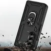 A black phone case with a ring holder is shown in a dynamic, action-oriented scene with debris flying around it, suggesting durability and protection. Produktbild-Vorschau