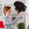 A young boy with red hair is holding a Darth Vader mask up to his face, looking at it. Anteprima dell’immagine prodotto