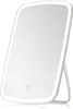 A white LED makeup mirror with a stand is shown against a white background. Produktbild-Vorschau