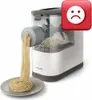 A pasta maker with freshly made pasta on a plate, with a sad face icon overlay. Produktbild-Vorschau