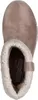 A top-down view of a taupe Skechers slip-in shoe with a cream-colored fuzzy lining. Voir les images du produit