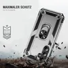 A rugged, silver smartphone case with a built-in ring stand is shown in a dynamic, action-oriented scene with debris flying around it, suggesting durability and protection. Produktbild-Vorschau