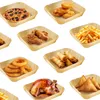 A collage of various fried foods and a whole roasted chicken, each presented in square, disposable paper trays. Produktbild-Vorschau