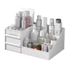 A white cosmetic organizer filled with various beauty products. Produktbild-Vorschau