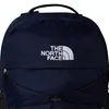 A close-up view of the front of a navy blue backpack with the North Face logo. Produktbild-Vorschau