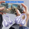 A person is holding a smartphone playing a game, with a pair of purple clip-on earbuds in the foreground. Produktbild-Vorschau