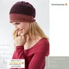 A woman wearing a knitted hat. Produktbild-Vorschau