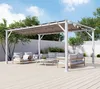 An outdoor living space with a pergola, seating, and a coffee table. Podgląd zdjęcia produktu