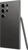 The back of a dark gray Samsung Galaxy S24 Ultra smartphone with its stylus inserted. Podgląd zdjęcia produktu