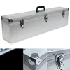 A long, silver aluminum case with a black handle and metal latches, shown from a slightly elevated diagonal angle. The bottom part of the image shows close-ups of the case's corner protectors, a latch, and a black interior. Produktbild-Vorschau