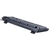 A black mechanical keyboard is shown from a side angle, resting on its feet. Produktbild-Vorschau
