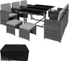 A rattan outdoor furniture set with a table, chairs, and ottomans, along with a protective cover.