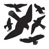 Several black silhouette decals of birds in flight against a white background. Produktbild-Vorschau