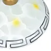 A close-up view of a pendant light fixture with a white, marbled glass shade and a decorative Greek key pattern around the rim. There are also yellow accents within the glass. Podgląd zdjęcia produktu