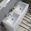 A modern bathroom vanity with a double sink, faucets, and a mirror reflected in the background. Anteprima dell’immagine prodotto