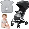 A baby, a stroller, and a pad are shown against a white background. Produktbild-Vorschau