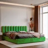 A green upholstered bed with a fluted headboard in a bedroom setting. Anteprima dell’immagine prodotto