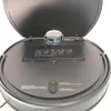 A close-up view of the top of a robot vacuum cleaner with its lid open. Produktbild-Vorschau