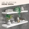 Two white floating shelves mounted on a textured gray wall, decorated with books, plants, and vases. Voir les images du produit