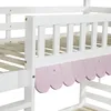 A close-up view of the side of a white wooden bunk bed with pink scalloped trim. Anteprima dell’immagine prodotto