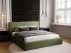 A bedroom with a green upholstered bed. Produktbild-Vorschau