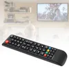 A remote control is shown in the foreground, with a blurred background of a living room and a television. Náhľad obrázku produktu
