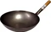 A wok with a wooden handle against a white background. Anteprima dell’immagine prodotto