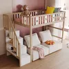 A children's bunk bed with a sofa underneath, decorated with stars and moons. Náhled obrázku produktu