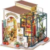 A miniature dollhouse kit of a flower shop with a greenhouse attached. Náhled obrázku produktu