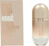 A perfume bottle and its packaging are displayed side-by-side against a white background. Podgląd zdjęcia produktu