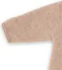 Close-up of a baby overall sleeve. Produktbild-Vorschau