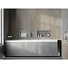 A modern bathroom with a bathtub, built-in shelves, and a vanity. Náhled obrázku produktu