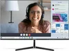A woman is on a video call on a computer monitor. The monitor screen displays the video call interface and various application windows. Náhled obrázku produktu