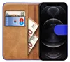 A book-style phone case for an iPhone 12/12 Pro, open to show card slots and cash. Produktbild-Vorschau
