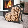 A heart-shaped firewood rack filled with logs is placed in front of a fireplace in a living room. Podgląd zdjęcia produktu