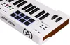 A close-up, angled view of a white Arturia KeyLab Essential 49 MK3 MIDI keyboard controller. Produktbild-Vorschau