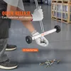 A person wearing gloves is demonstrating a magnetic sweeper tool, collecting screws and nails from a workshop floor. Podgląd zdjęcia produktu