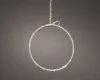 A circular light ring with warm white LEDs is suspended by a string. Produktbild-Vorschau