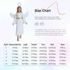 A child modeling an angel costume next to a size chart. Náhľad obrázku produktu